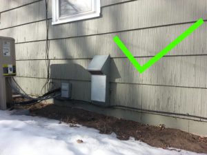 Combustion air intake on side of home with no snow or vegetation blocking airflow.